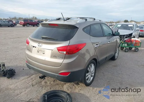 2012 Hyundai Tucson Limited z USA, uszkodzony, nr VIN KM8JU3AC1CU530974
